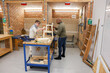 © Caia Image - Disabled men working in workshop