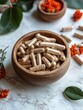 © Alief - Herbal Capsules in Wooden Bowl on Marble.