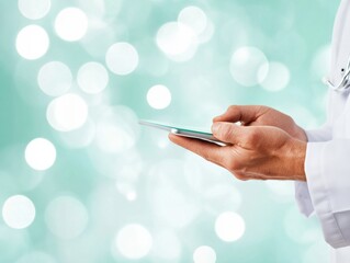 Leinwandbilder - Minimalist Telemedicine Innovation Soft-Focus Digital Health Interface with Healthcare Professional Navigating Advanced Mobile Diagnostic Technology