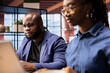 © DC Studio - African American couple in their home office collaborate on a business project, using teamwork and digital online tools to enhance efficiency and career growth. Solving freelancing tasks.