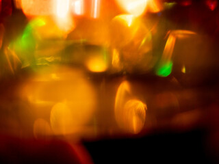 Wall Mural - abstract bokeh background with warm color. digital background for design. lens flare and light glow.
