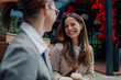 © Zamrznuti tonovi - Two businesswomen chatting during coffee break outside office
