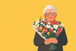 © EnGbarr - illustrated senior woman holding flowers on orange background