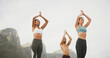 © Emil Lime/peopleimages.com - Breathing, nature or meditation for group, calm and spiritual practice for wellness, peace or zen. Faith, chakra and self aware for people, mindfulness or yoga with low angle for prayer hands outdoor