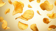 © Vitalii - falling crispy potato chips on a beige background, without people, snack