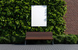 © Premium - mockup of blank billboard in front of wooden bench against green wall. scene is serene and inviting, perfect for showcasing advertisements or art