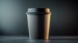 © Nataliia_Trushchenko - Black coffee cup with a lid sits on a table. The cup is made of paper and has a black lid