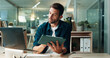 © peopleimages.com - Tablet, reading and laptop with business man in office for planning, ui designer and app review. Developer solutions, client feedback and research with person in agency for project idea and startup