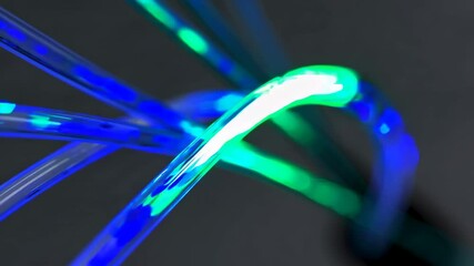 Leinwandbilder - Close-up of glowing blue and green fiber optic cables, abstract technology concept