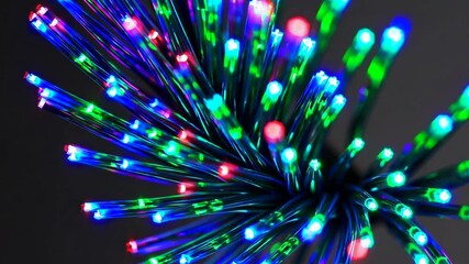 Leinwandbilder - Close-up of colorful glowing fiber optic cables in the dark. Technology concept