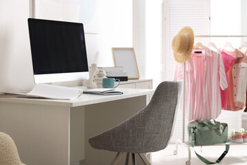 Poster - home office. comfortable workplace near white wall. desk with computer and other furniture in room