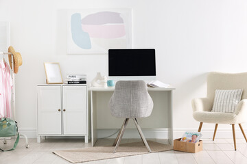 Poster - home office. comfortable workplace near white wall. desk with computer and other furniture in room