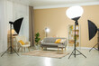 © New Africa - Professional photo studio equipment prepared for shooting living room interior