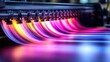 © mukidi - Colorful printing press in action, vibrant inks, factory background, industrial process