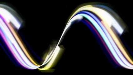 Wall Mural - colorful light trails flowing on black background. abstract motion graphics concept. perfect footage