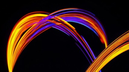 Wall Mural - colorful abstract lines crossing and waving on black background. abstract motion graphics concept. p