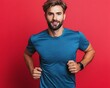 © bilqis - Man running on red background, health, lifestyle