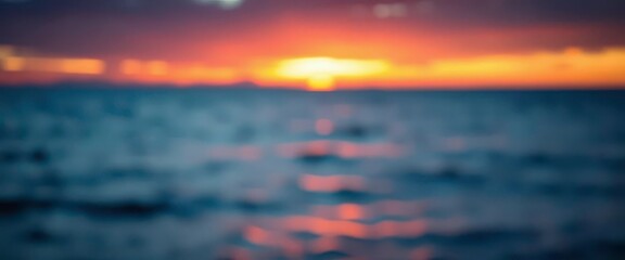 Wall Mural - dreamy, hazy sunset over a blurred ocean scene soft blues and oranges blend seamlessly, blurry, back
