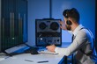 © Serhii - A police officer records a telephone conversation on a tape recorder. secret agent