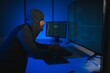 © Serhii - Hacker Using Multiple Computers For Stealing Data On Desk