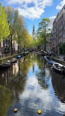 Wall Mural - facades of old historic houses over canal water, amsterdam, netherlands