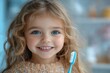 © Aupurbo - Cheerful Child Practicing Good Dental Habits With a Toothbrush in Her Hand While Smiling Bright at a Cozy Home Setting
