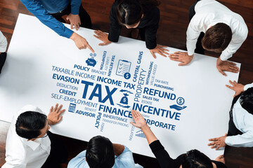 Aufkleber - A group of diverse professionals engaged in a collaborative discussion focused on tax strategies and financial incentives in a modern office setting. Amity