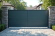 © Pete - Wide automatic sliding gate made of planks with remote control, installed in high stone fence wall. Security, protection, privacy concept for automated property. Modern, electrical design, closed