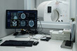 © pressmaster - Monitoring brain scan results in a modern medical facility with advanced imaging equipment and computer displays showing detailed brain images and medical data