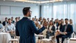 © VistaVisions - Confident businessman giving a presentation in front of crowd in meeting conference seminar room. Leadership authority teamwork in business concept