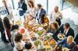 © Rawpixel.com - A diverse group of people enjoying a vibrant buffet spread. Men and women of various ethnicities gather around a table filled with delicious food, sharing laughter and conversation.