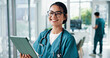 © peopleimages.com - Nurse, woman and portrait with tablet in hospital for telehealth, online medical records or healthcare report. Medicine, doctor and happy with digital app for clinic schedule and health information