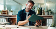 © peopleimages.com - Tablet, scroll and smile with business man in office for planning, ui designer and app review. Developer solutions, client feedback and research with person in agency for project idea and startup
