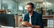 © CC/peopleimages.com - Office, computer and business man with food on lunch break for wellness, nutrition and energy. Professional, web designer and hungry person with takeaway for eating meal, snack and salad on laptop