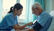 © if - Nurses measure blood pressure for elderly people