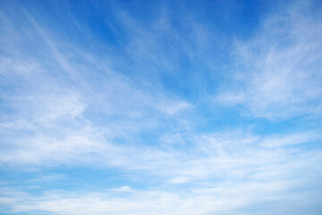 Wall Mural - beautiful blue sky with soft white clouds for abstract background