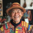© Володимир Дубецький - Traditional artisan smiles warmly while showcasing his colorful craftsmanship in a vibrant studio setting