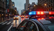 © Margarita - Police car with flashing lights responding in urban environment for news articles, blogs, websites, safety campaigns, law enforcement education, and crime awareness materials