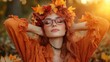 © Nena Photo - A serene woman enjoying the beauty of autumn, adorned with leaves in her hair, as she basks in soft sunlight that creates a magical ambiance of tranquility and connection.