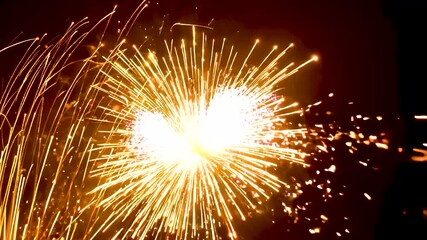 Wall Mural - Fiery Burst: Intense Sparkler Explosion in Dark Background