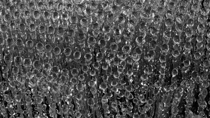 Fototapete - Super Slow Motion of Splashing Water on Black Background with Beautiful Big Water Drops. Filmed on High Speed Cinema Camera, 1000fps.