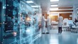 © Chanwit - Large Digital Display Showcasing Complex Medical Data Dominates Foreground with Medical Professionals Interacting in Bright Hospital Environment Behind
