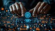 © Biancaart - Hands and glowing gears on a complex electronic circuit board backdrop