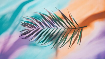 Poster - Single palm frond on pastel fabric background with vibrant shadows.