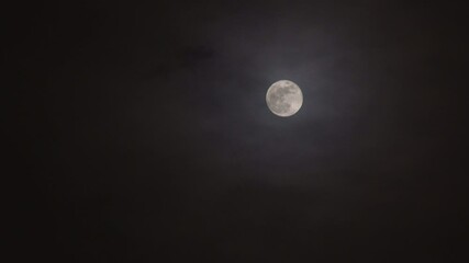 Wall Mural - Bright full moon in the misty and cloudy night sky