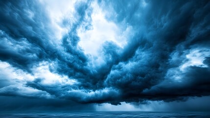 dramatic stormy clouds, dark blue sky, overhead view, weather, natural phenomenon, nature background
