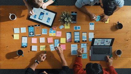 Wall Mural - top view of developer and designer shake hand together at meeting. software developer handshake and 