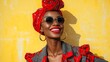 © Artem - Joyful fashionista in sunglasses against bright yellow backdrop