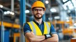 © khonkangrua - Confident Young Construction Worker in Safety Gear Smile in Warehouse Environment with Industrial Background