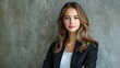 © slotzstock - Confident Young Businesswoman Portrait